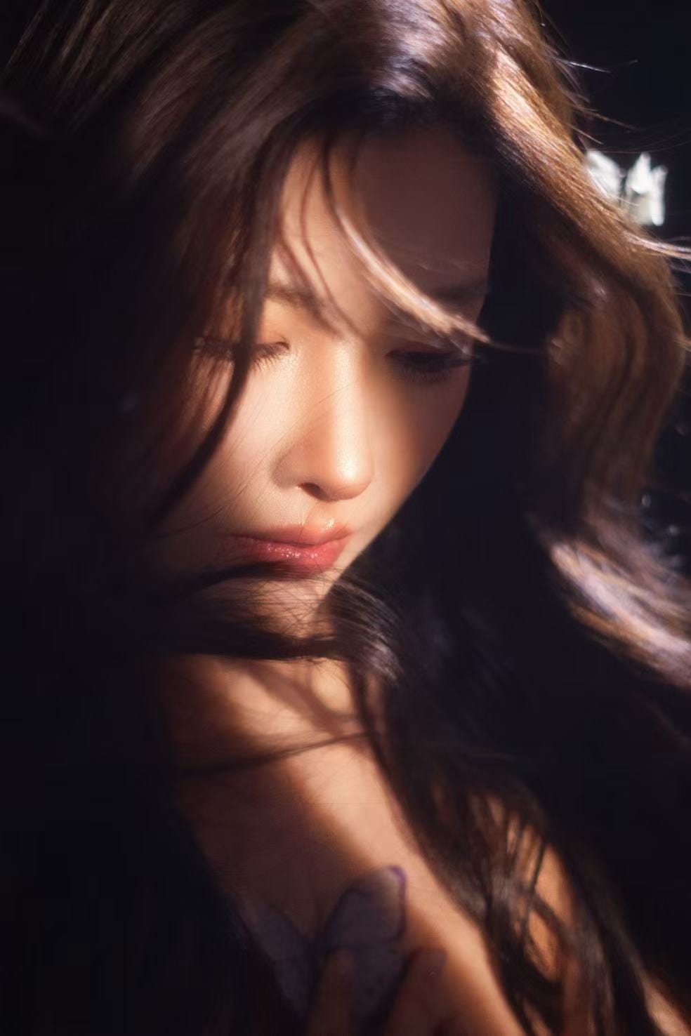 K9 Studio Light & Shadow style close-up portrait, warm side lighting through loose hair